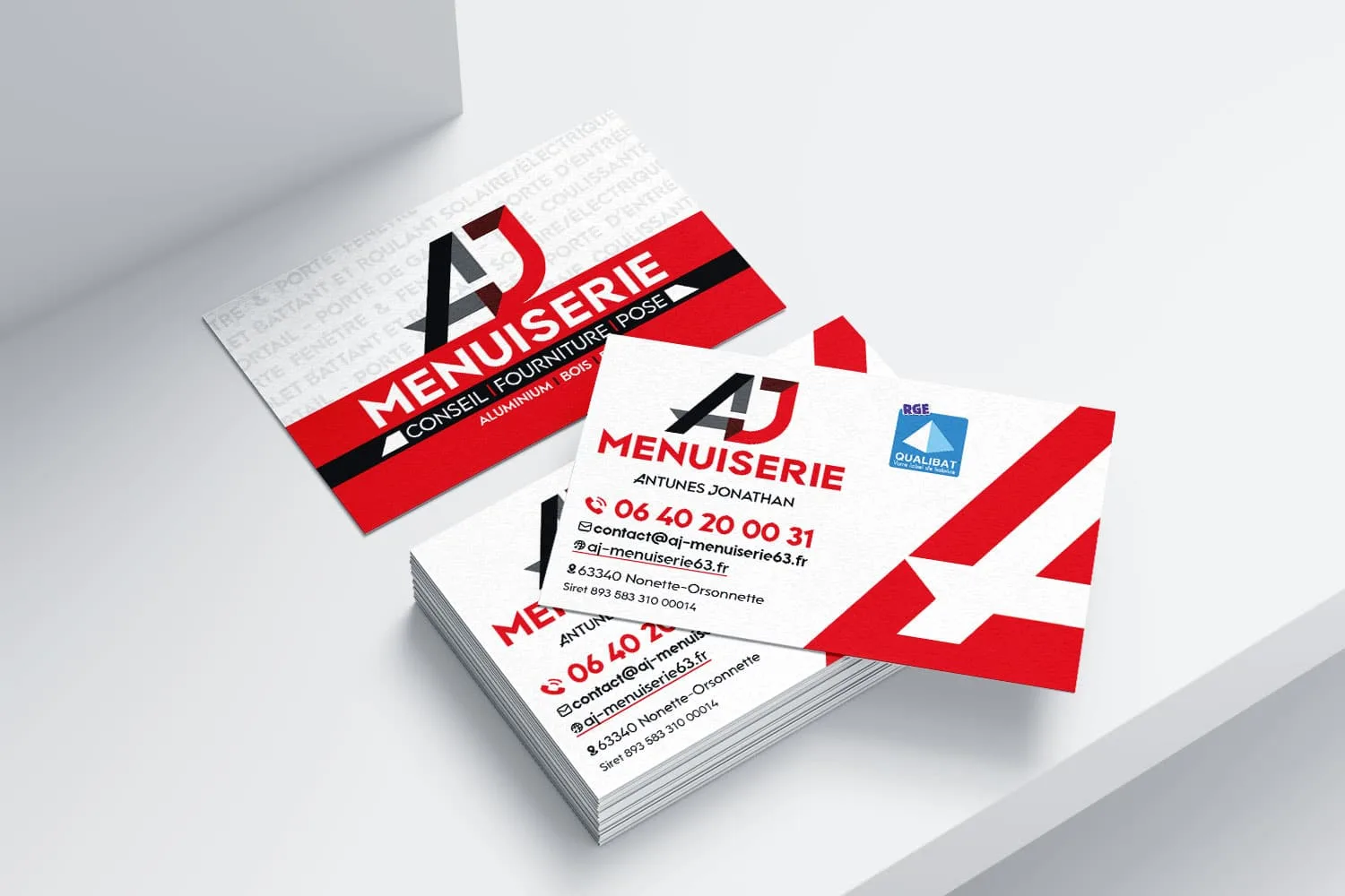 Design et impression des cartes de visite d'AJ Menuiserie - Menuiserie extérieure à Issoire, Brioude
